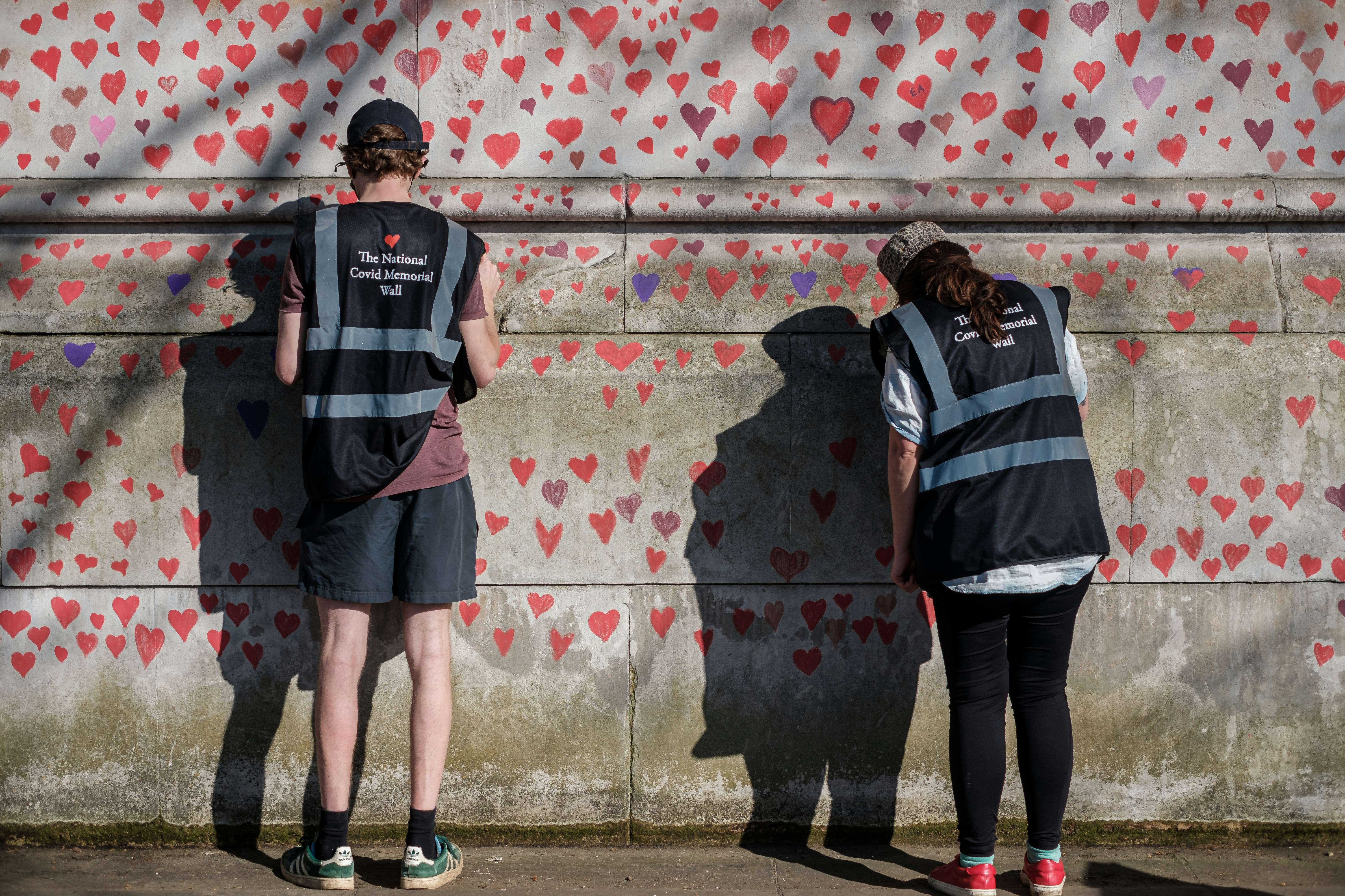 It has been over a Year since Coronavirus struck and shut down the UK; Today Near St Thomas Hospital a National Memorial has been set up to allow people to pay their respects and to mark the walls of the Queen's Walk with Love Hearts, Labour Leader Keir Starmer made is the presence and talked to the few who spent most of today adding Hearts to the walls.
